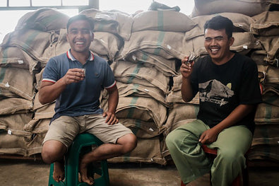 Two Indonesian coffee producers sitting down
