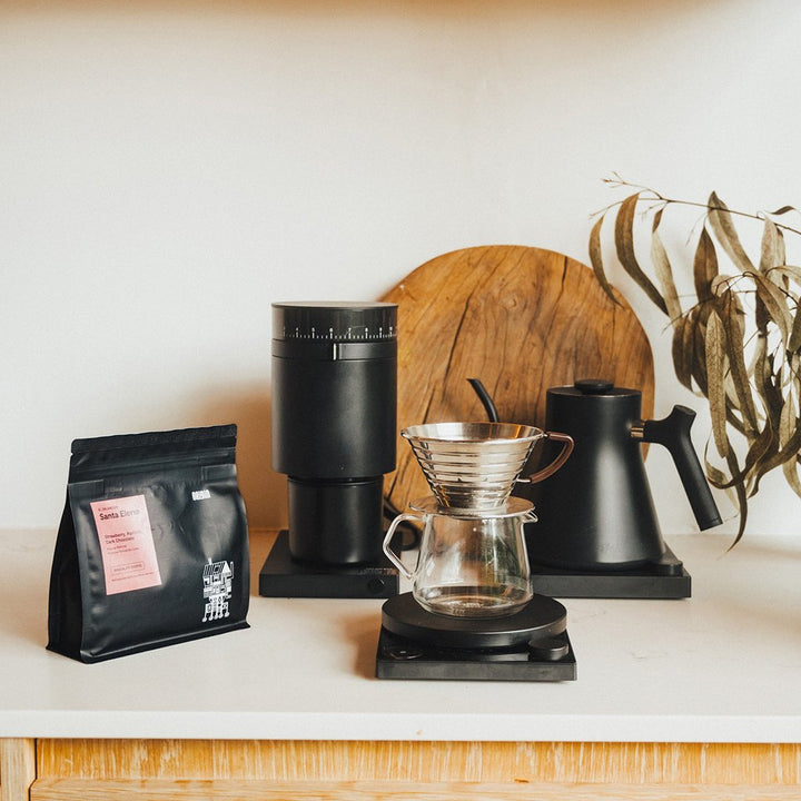 Selection of coffee gifts on table