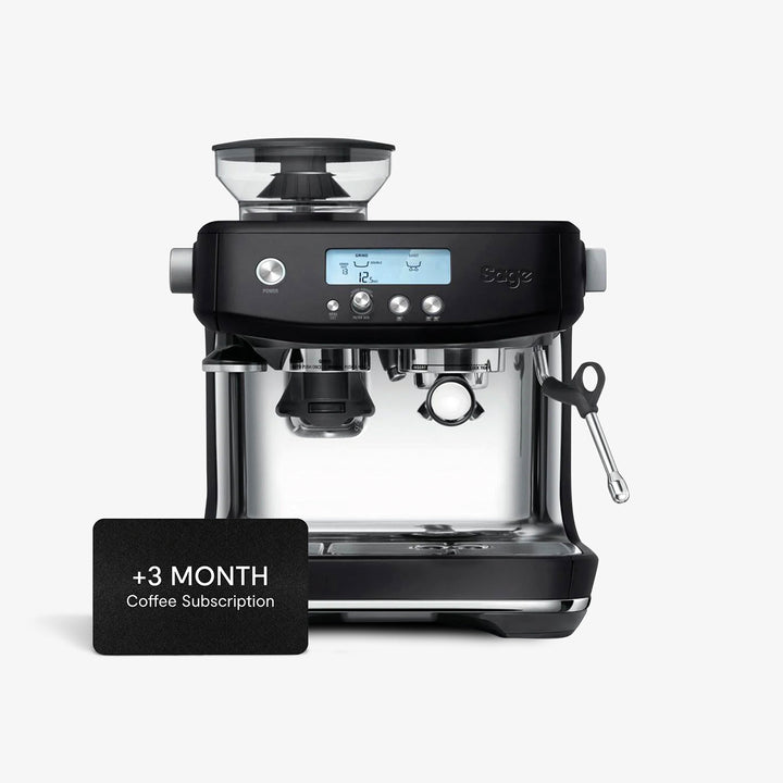 A black Sage Barista Pro espresso machine featuring a built-in grinder, LCD display, steam wand, and a free 3-month coffee subscription, ideal for making barista-quality coffee at home.