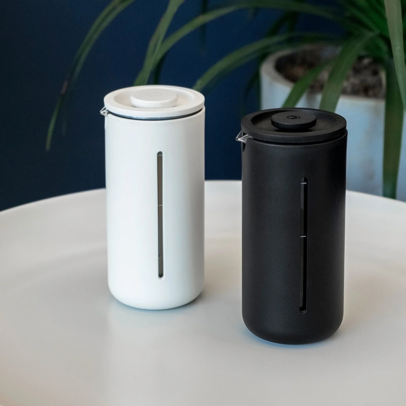 Two Timemore french press on table